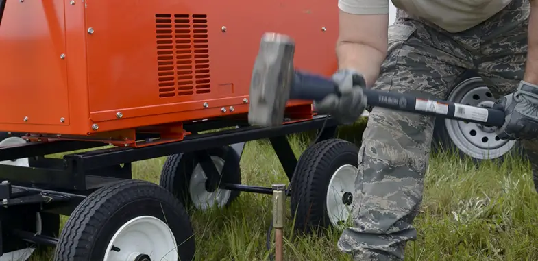 hammering in the copper grounding rod