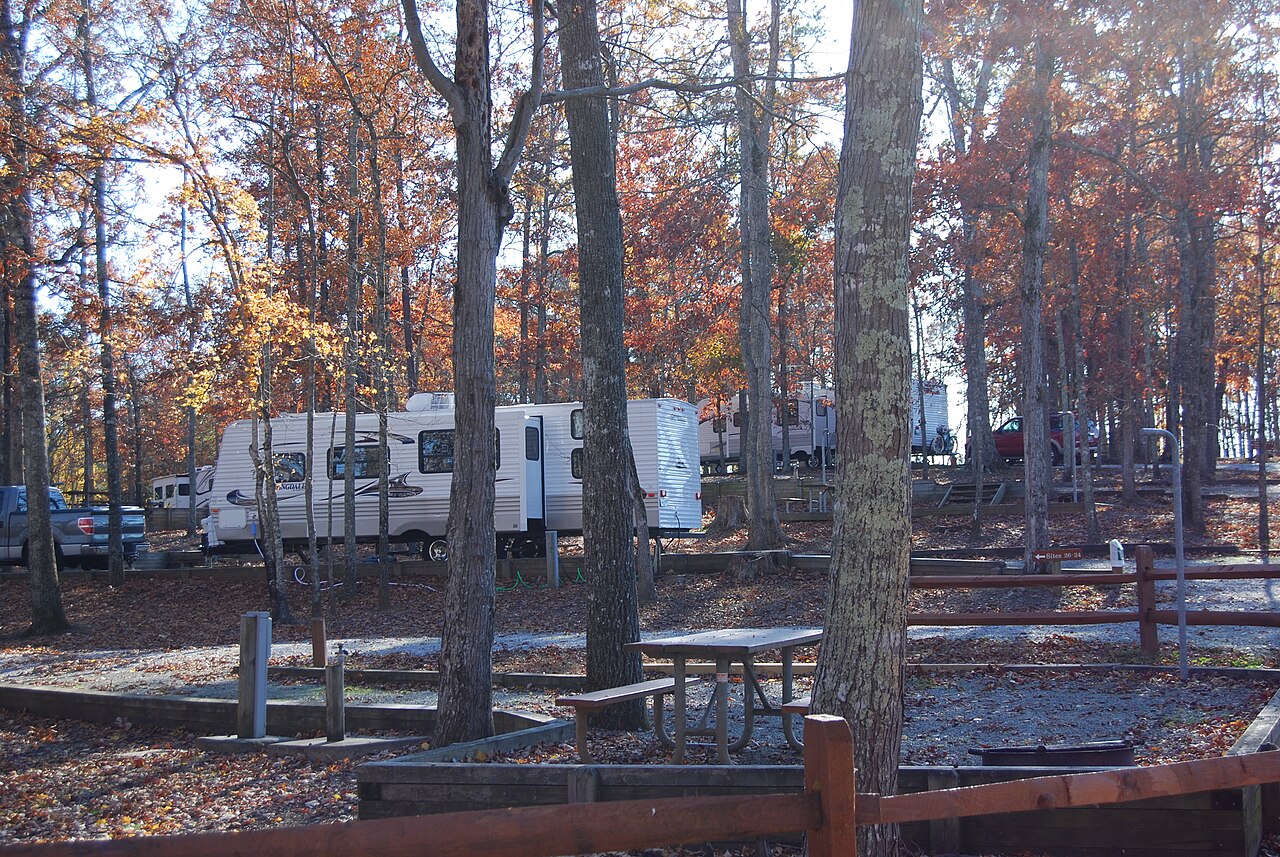 RVs parked at a state park campground in the fall