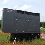 Standby backup generator outside a visitor center